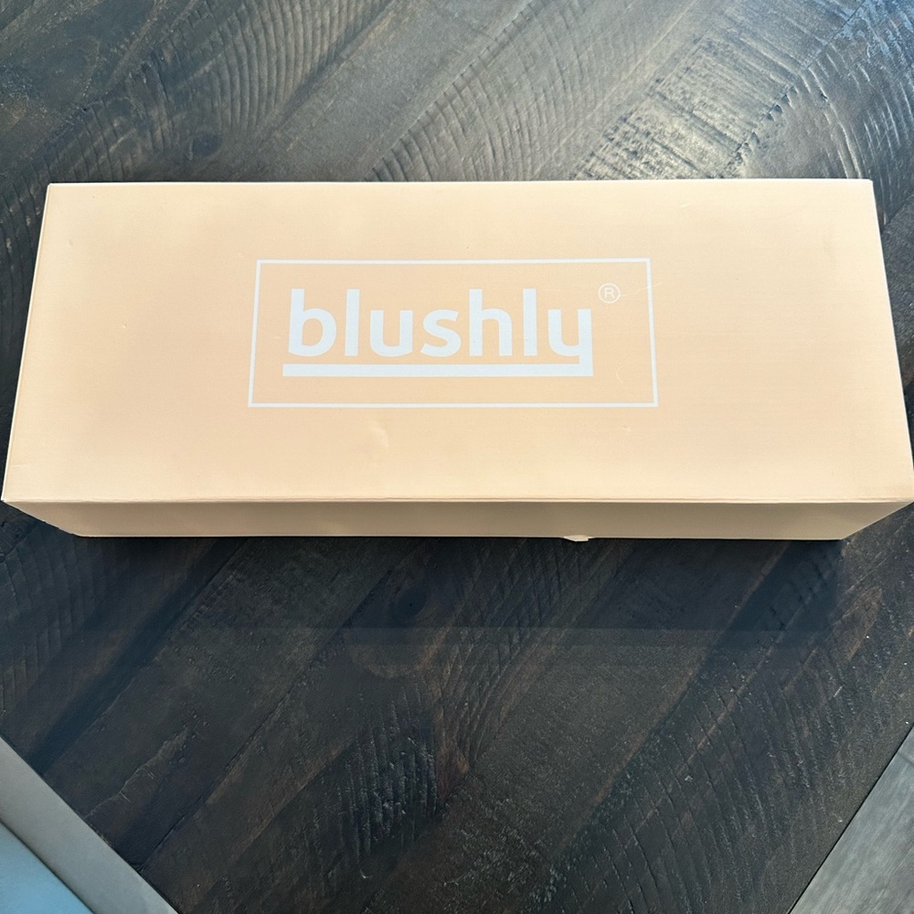 Blushly brand powered body scrubber. Brand new. Not used.